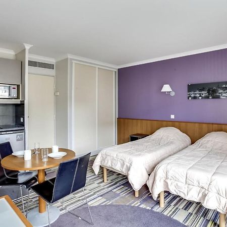 Guestready - Studio Cosy Pres Du Metro อิซซีเลมูลิโนต์ ภายนอก รูปภาพ
