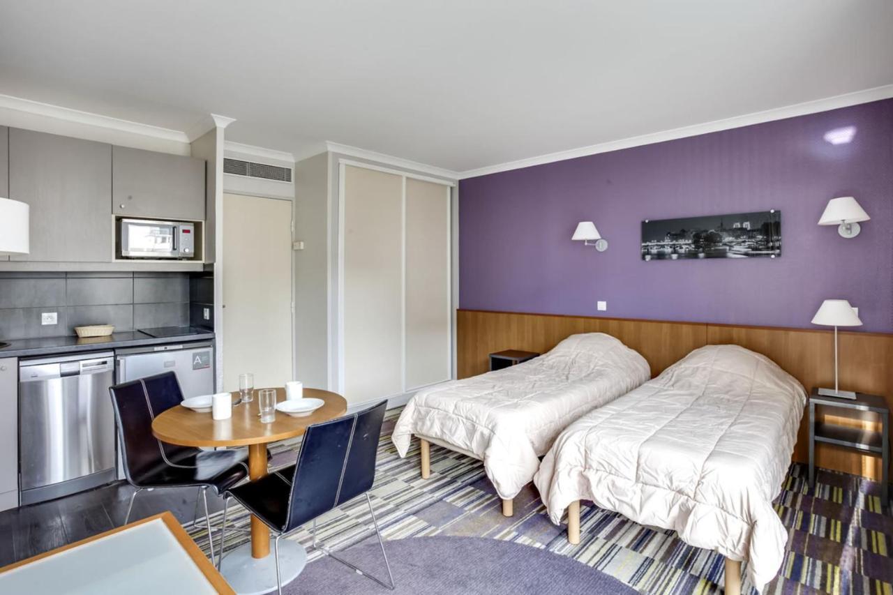Guestready - Studio Cosy Pres Du Metro อิซซีเลมูลิโนต์ ภายนอก รูปภาพ