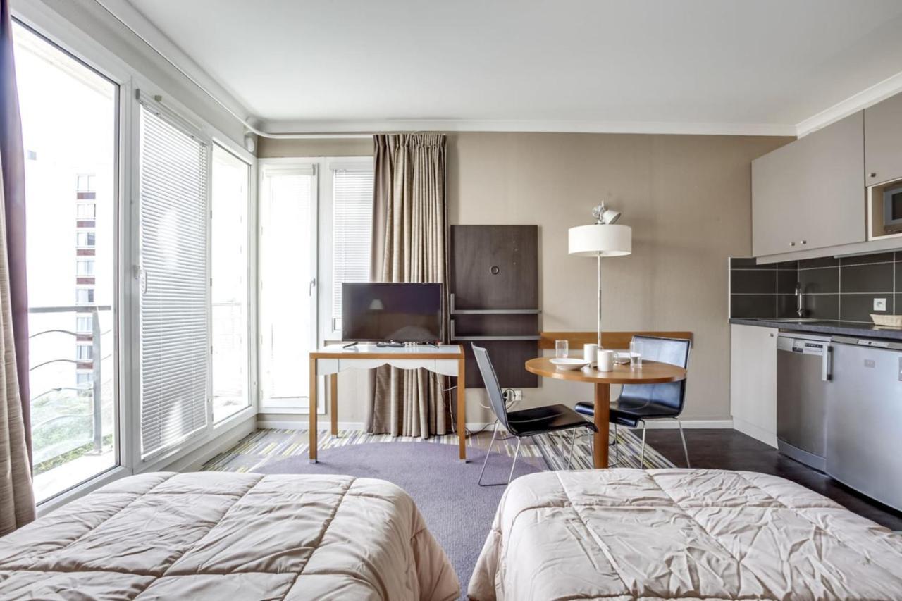 Guestready - Studio Cosy Pres Du Metro อิซซีเลมูลิโนต์ ภายนอก รูปภาพ
