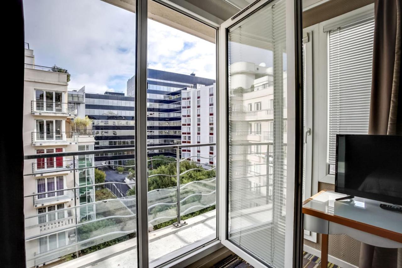Guestready - Studio Cosy Pres Du Metro อิซซีเลมูลิโนต์ ภายนอก รูปภาพ