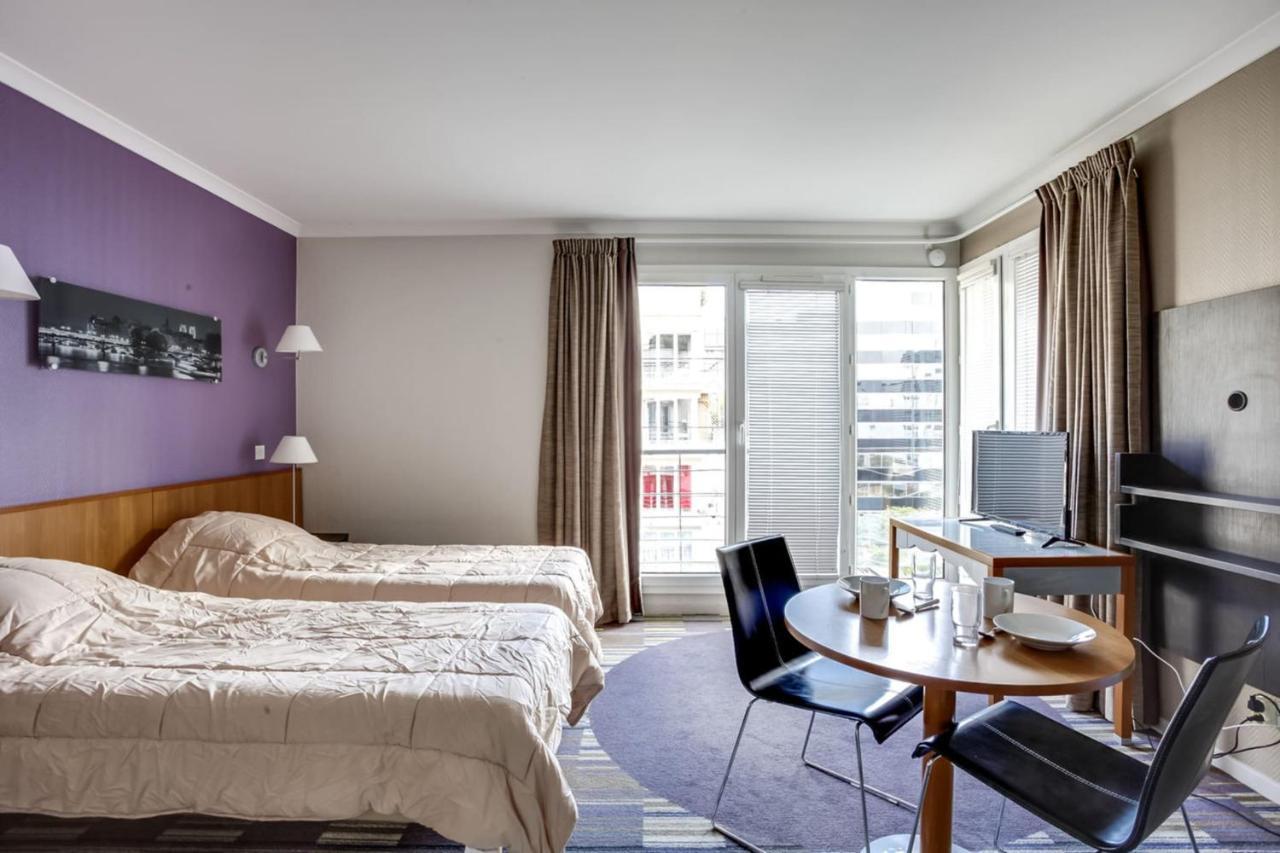 Guestready - Studio Cosy Pres Du Metro อิซซีเลมูลิโนต์ ภายนอก รูปภาพ