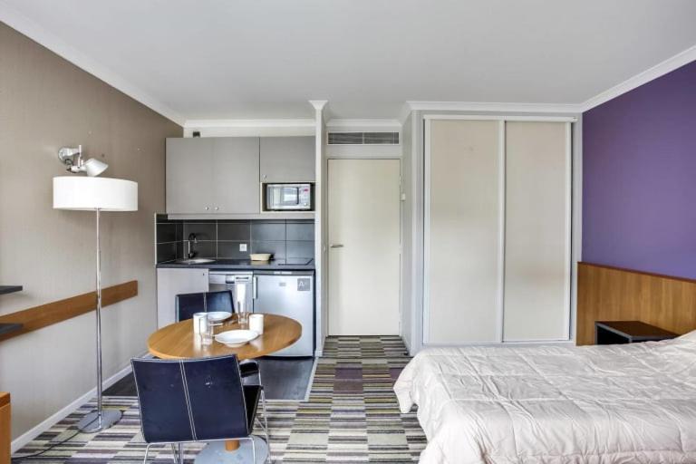 Guestready - Studio Cosy Pres Du Metro อิซซีเลมูลิโนต์ ภายนอก รูปภาพ