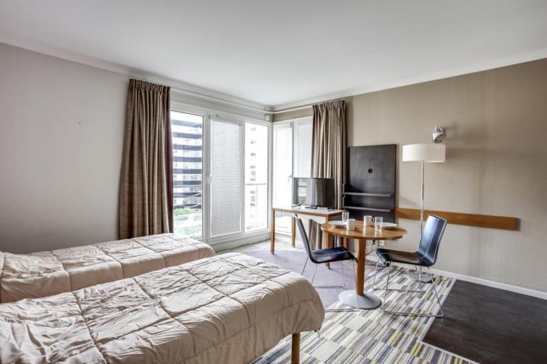 Guestready - Studio Cosy Pres Du Metro อิซซีเลมูลิโนต์ ภายนอก รูปภาพ