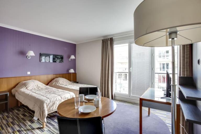 Guestready - Studio Cosy Pres Du Metro อิซซีเลมูลิโนต์ ภายนอก รูปภาพ